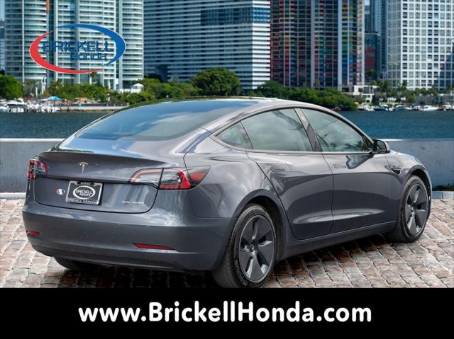 used 2023 Tesla Model 3 car, priced at $28,000