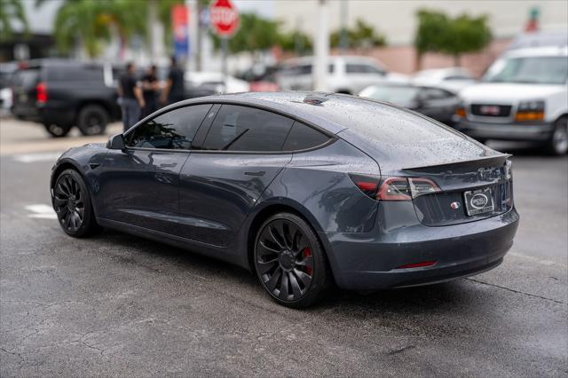 used 2022 Tesla Model 3 car, priced at $30,000