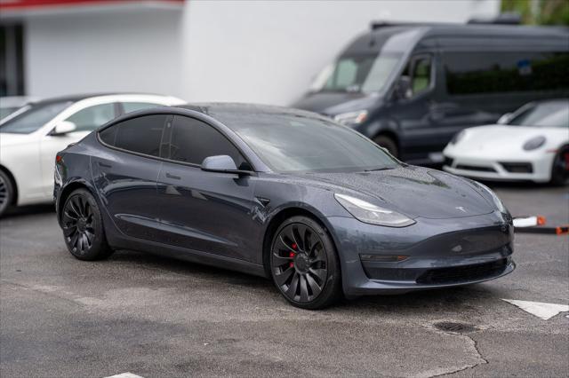 used 2022 Tesla Model 3 car, priced at $30,000