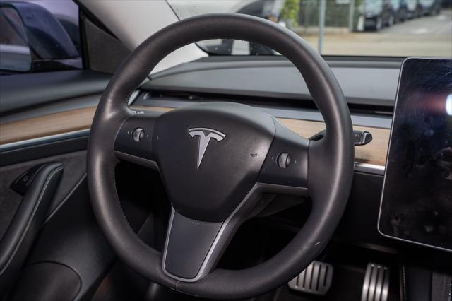 used 2022 Tesla Model 3 car, priced at $30,000