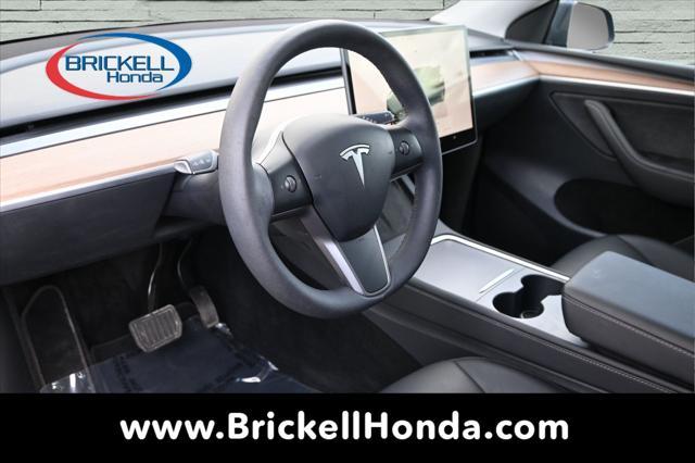 used 2023 Tesla Model Y car, priced at $28,000