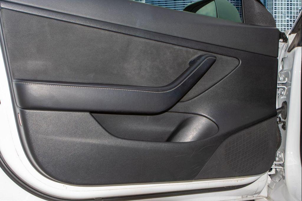 used 2021 Tesla Model 3 car, priced at $18,000