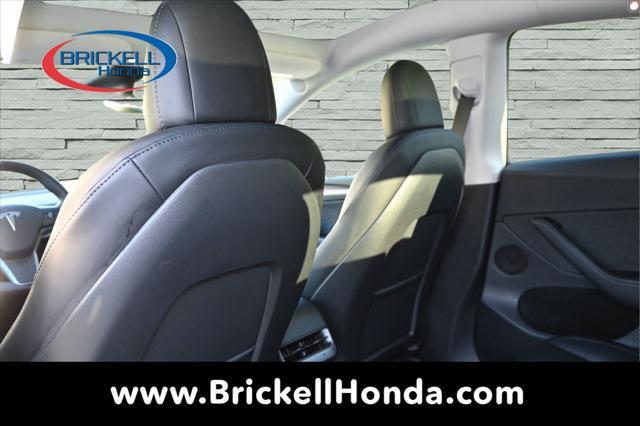 used 2023 Tesla Model Y car, priced at $28,500