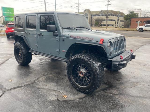 used 2013 Jeep Wrangler Unlimited car, priced at $17,980