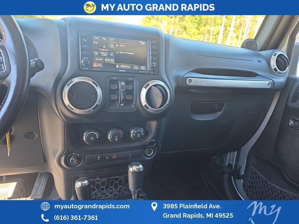 used 2014 Jeep Wrangler Unlimited car, priced at $14,605