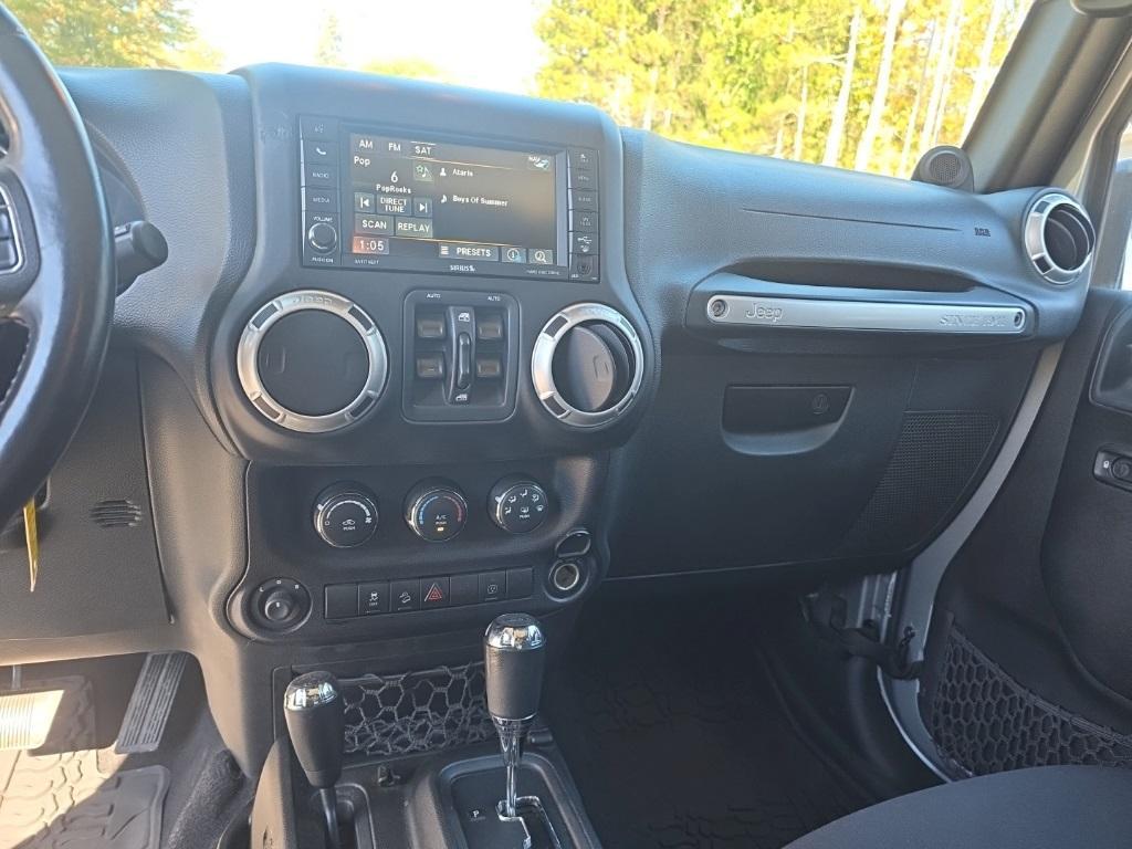 used 2014 Jeep Wrangler Unlimited car, priced at $15,220