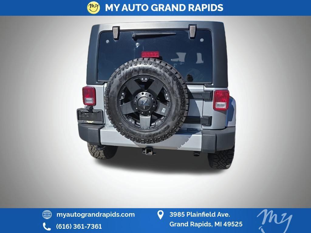 used 2014 Jeep Wrangler Unlimited car, priced at $14,605