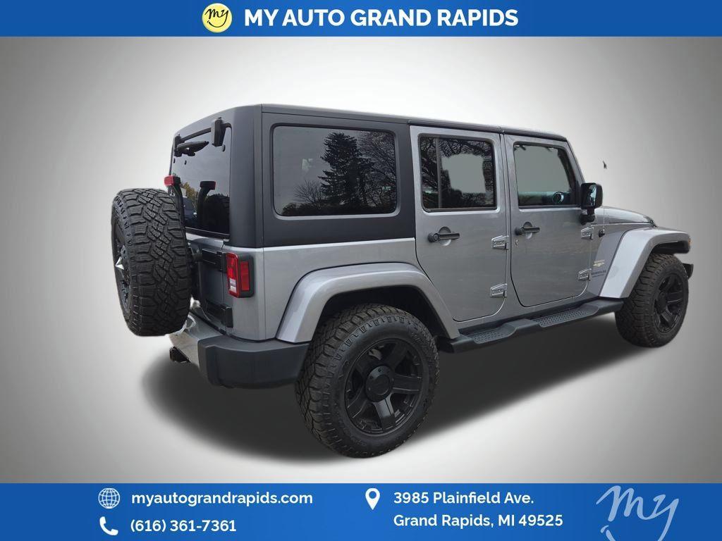 used 2014 Jeep Wrangler Unlimited car, priced at $14,605