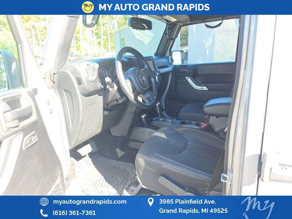 used 2014 Jeep Wrangler Unlimited car, priced at $14,605