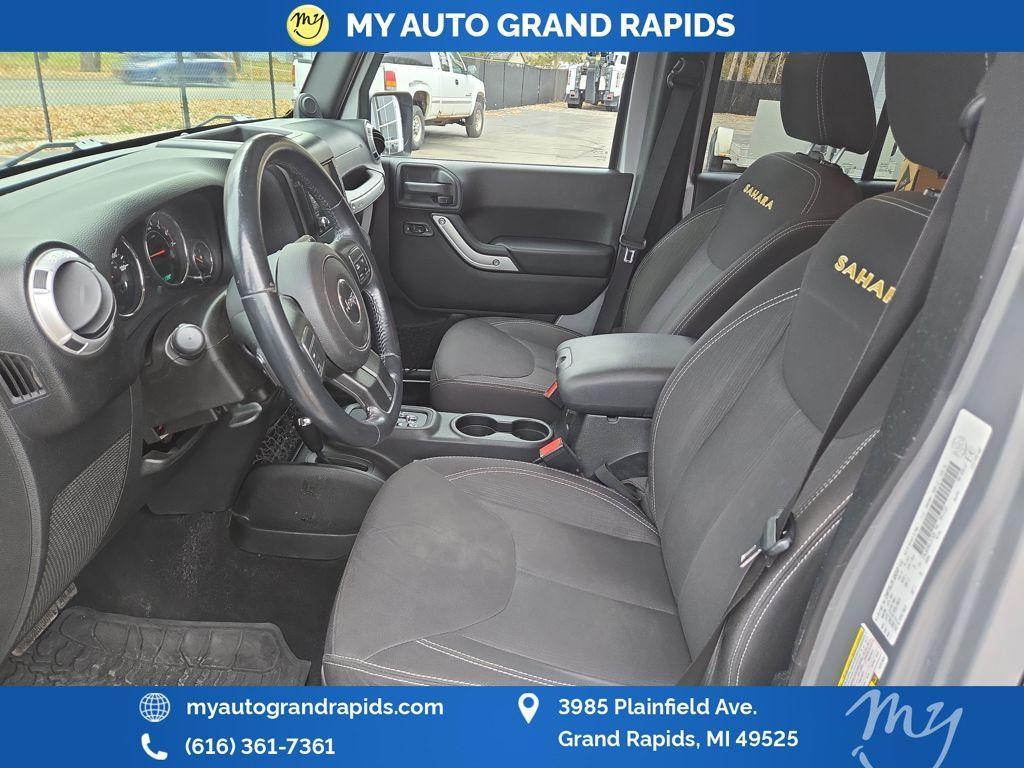 used 2014 Jeep Wrangler Unlimited car, priced at $14,605