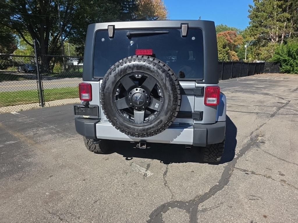 used 2014 Jeep Wrangler Unlimited car, priced at $15,220
