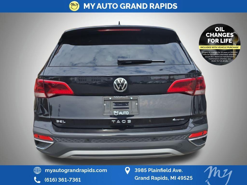 used 2024 Volkswagen Taos car, priced at $26,802