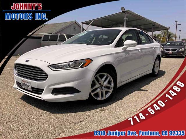 used 2014 Ford Fusion car, priced at $6,999