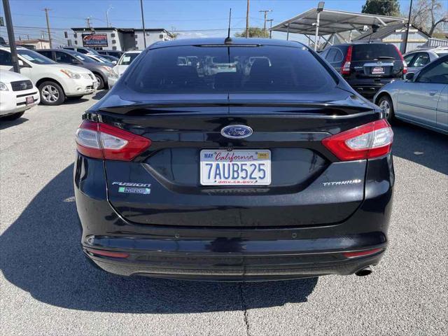 used 2013 Ford Fusion Energi car, priced at $6,950