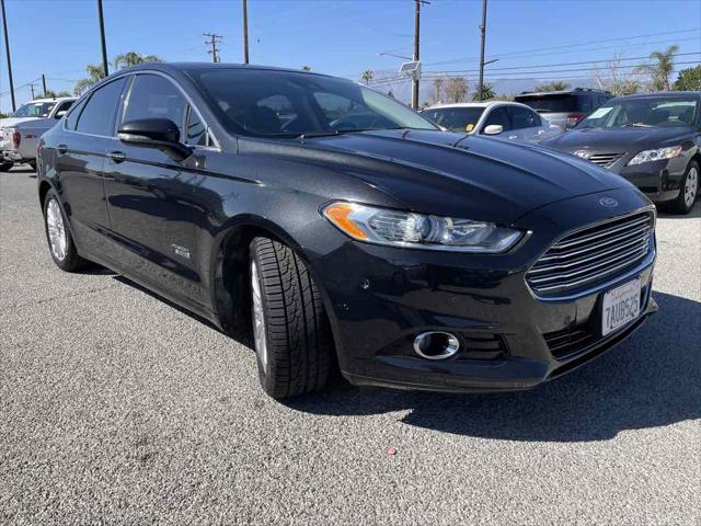 used 2013 Ford Fusion Energi car, priced at $6,950