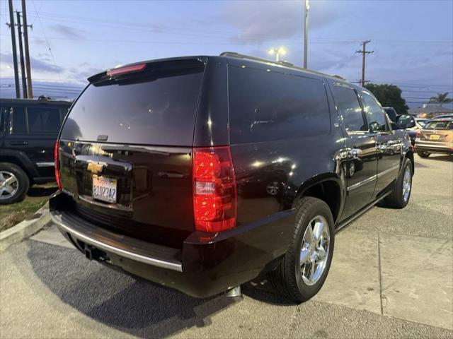 used 2014 Chevrolet Suburban car, priced at $11,950