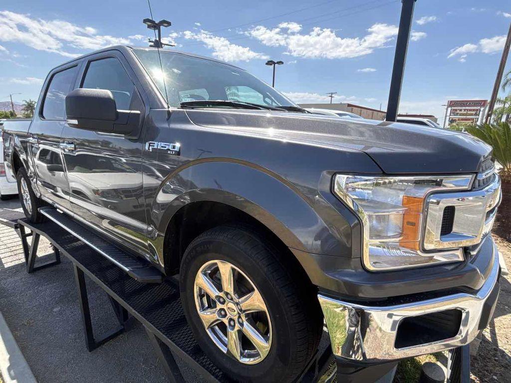 used 2018 Ford F-150 car, priced at $14,950