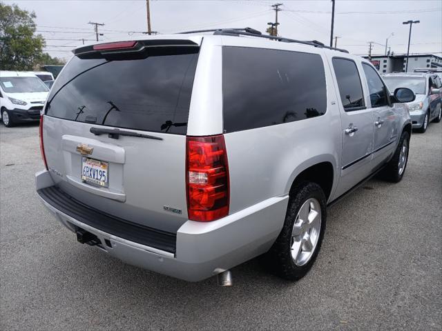 used 2011 Chevrolet Suburban car, priced at $11,950