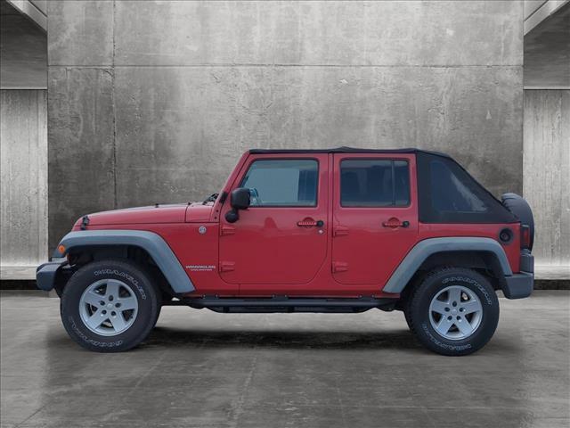 used 2011 Jeep Wrangler Unlimited car, priced at $15,998