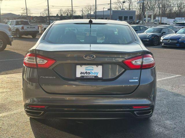 used 2016 Ford Fusion car, priced at $11,799