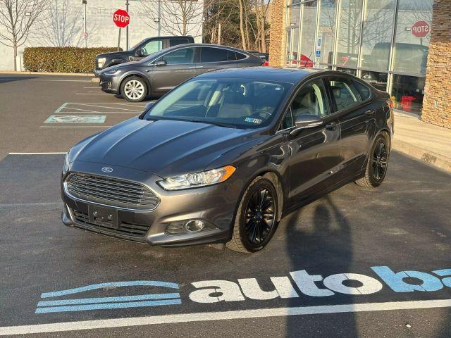 used 2016 Ford Fusion car, priced at $11,799