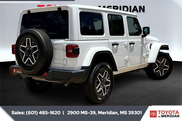 used 2024 Jeep Wrangler car, priced at $37,866