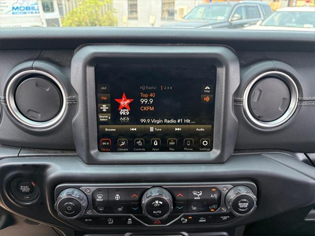 used 2021 Jeep Wrangler Unlimited car, priced at $33,199