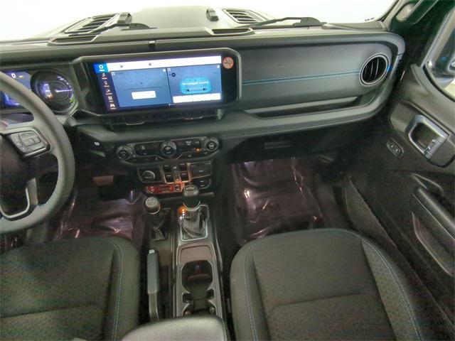used 2024 Jeep Wrangler 4xe car, priced at $32,030