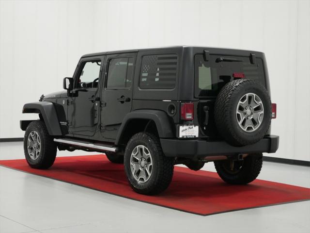 used 2013 Jeep Wrangler Unlimited car, priced at $18,491