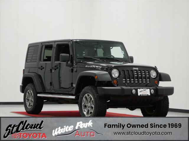 used 2013 Jeep Wrangler Unlimited car, priced at $18,491