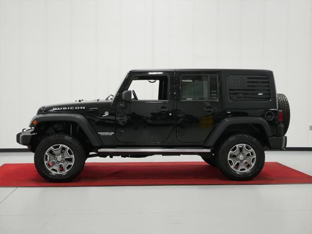 used 2013 Jeep Wrangler Unlimited car, priced at $18,491