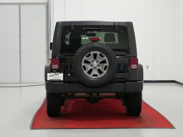 used 2013 Jeep Wrangler Unlimited car, priced at $18,491