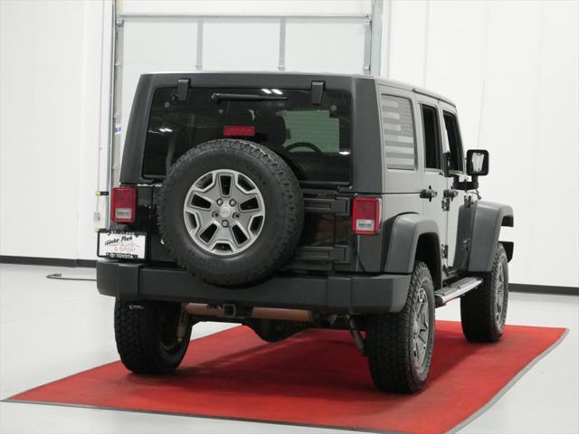 used 2013 Jeep Wrangler Unlimited car, priced at $18,491