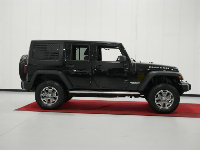 used 2013 Jeep Wrangler Unlimited car, priced at $18,491