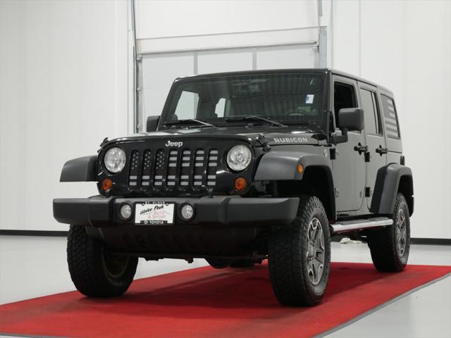 used 2013 Jeep Wrangler Unlimited car, priced at $18,491