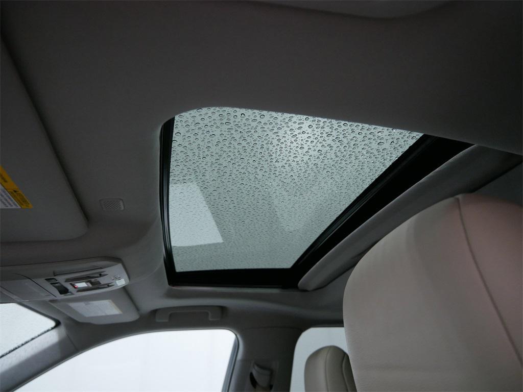 used 2021 Toyota Highlander Hybrid car, priced at $39,491