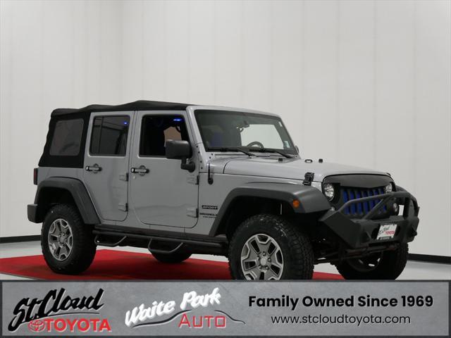 used 2014 Jeep Wrangler Unlimited car, priced at $18,991