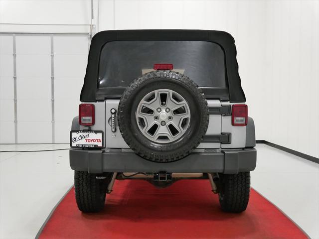 used 2014 Jeep Wrangler Unlimited car, priced at $18,991