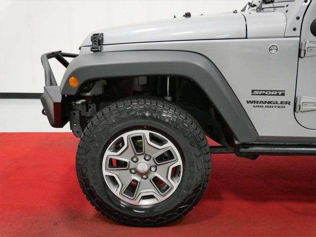 used 2014 Jeep Wrangler Unlimited car, priced at $18,991