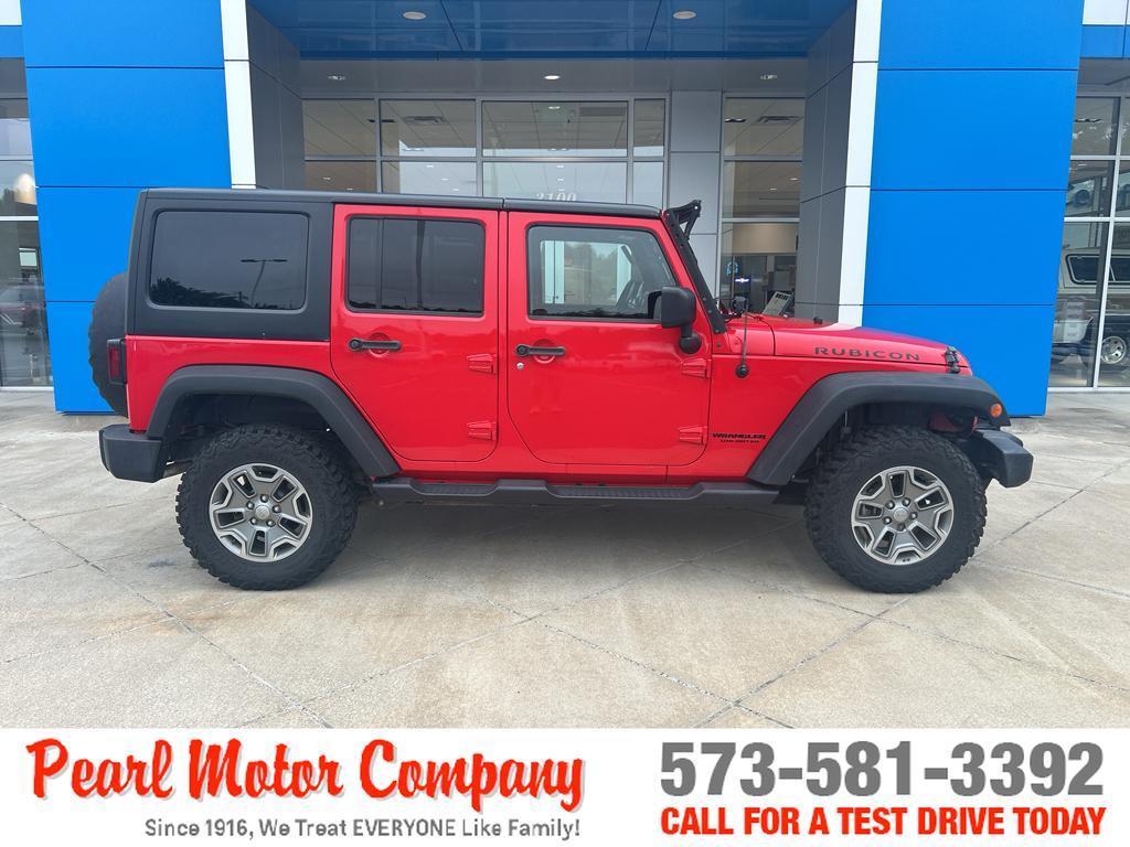 used 2015 Jeep Wrangler Unlimited car, priced at $23,500