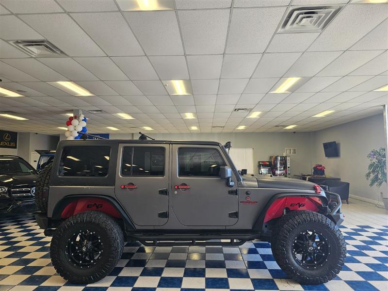 used 2014 Jeep Wrangler Unlimited car, priced at $17,995