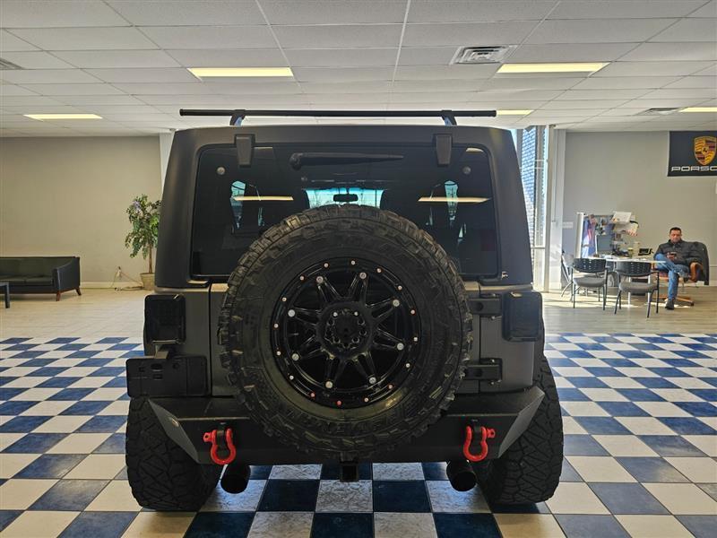 used 2014 Jeep Wrangler Unlimited car, priced at $17,995