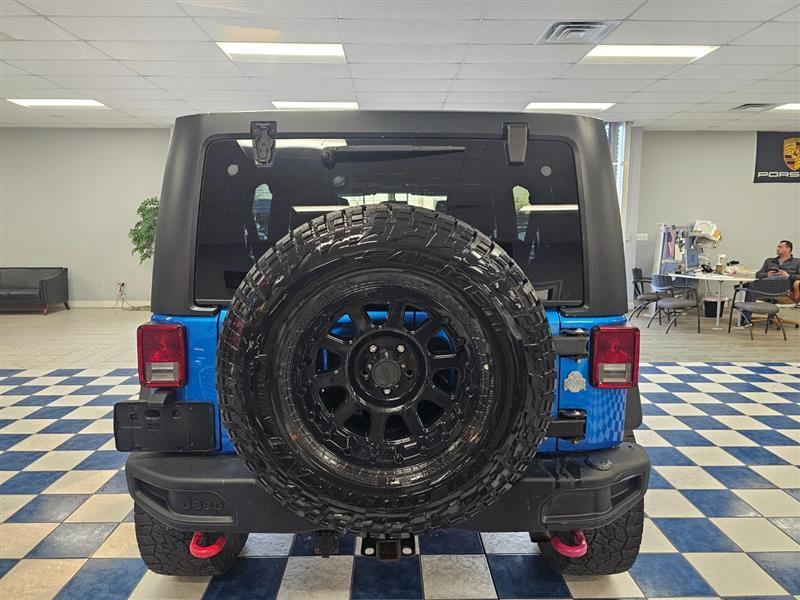 used 2015 Jeep Wrangler Unlimited car, priced at $19,995