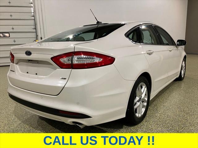 used 2016 Ford Fusion car, priced at $9,650