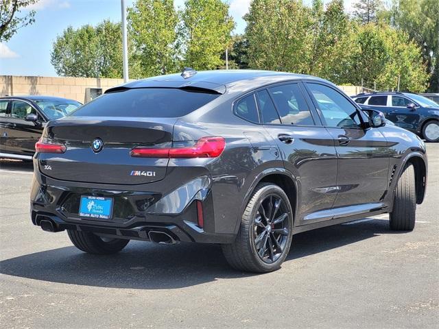 used 2024 BMW X4 car, priced at $60,499