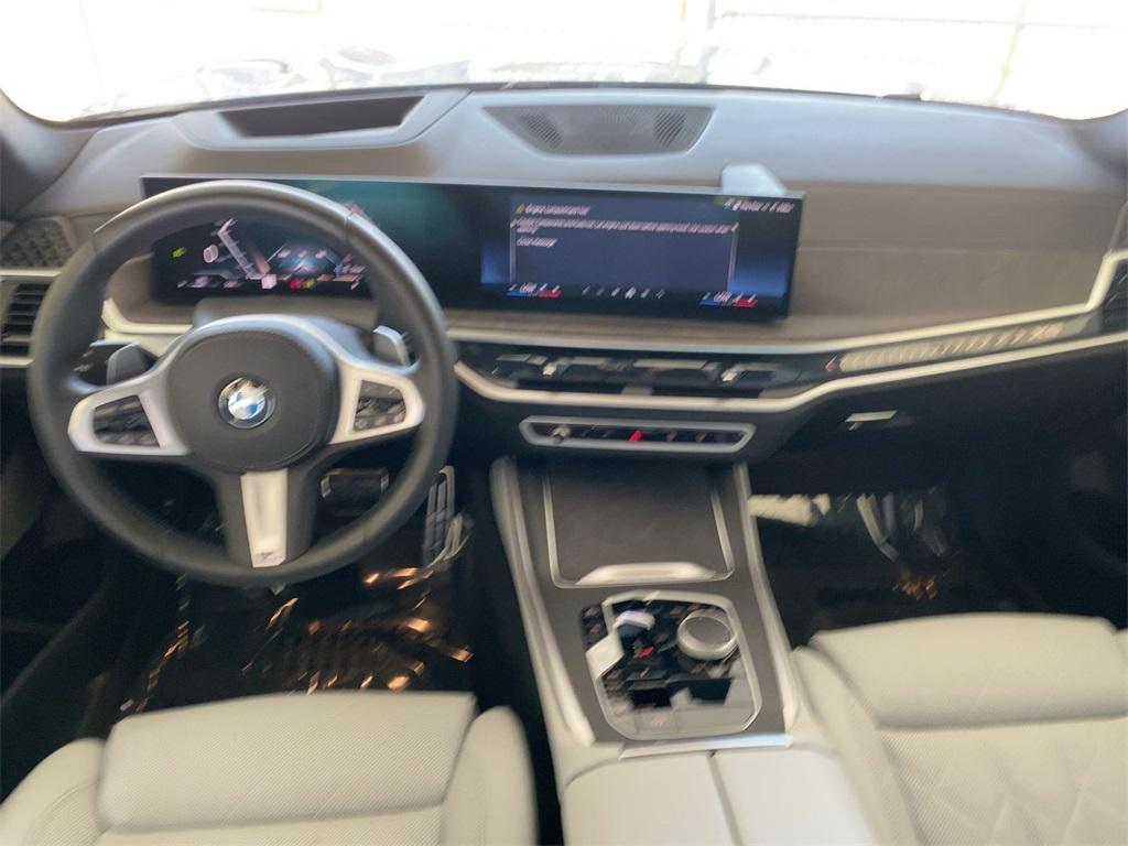 used 2025 BMW X5 car, priced at $62,936