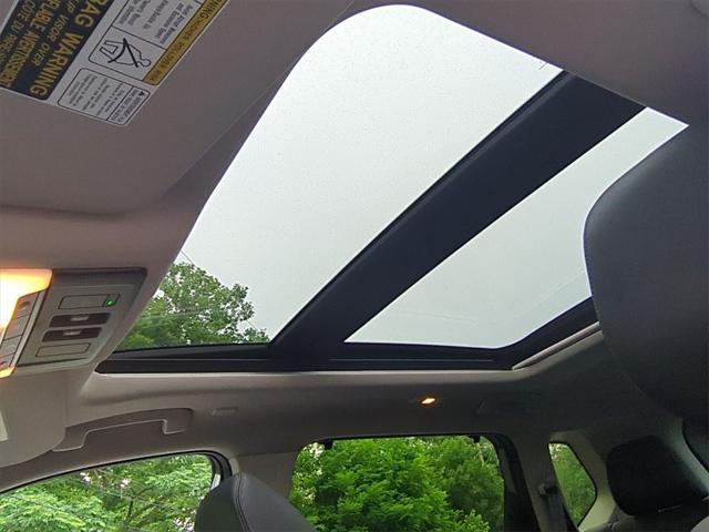 used 2023 Nissan Rogue car, priced at $30,000