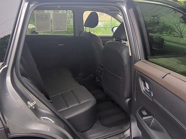 used 2023 Nissan Rogue car, priced at $30,000