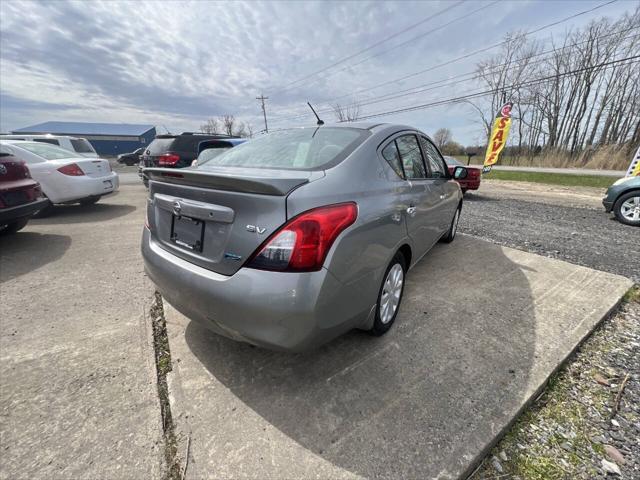 used 2014 Nissan Versa car, priced at $5,995