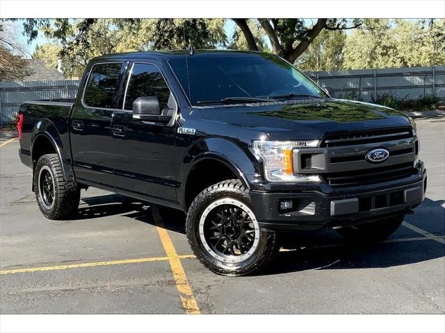 used 2018 Ford F-150 car, priced at $24,665